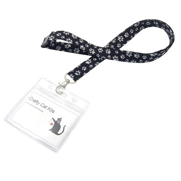 Fabric badge holder featuring paw prints with attached pvc card holder