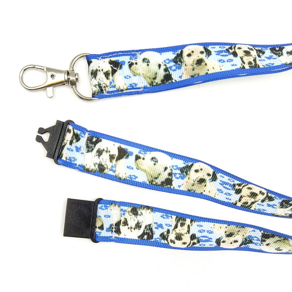 Close up of blue ribbon with dalmatians including metal swivel clasp and black safety buckle