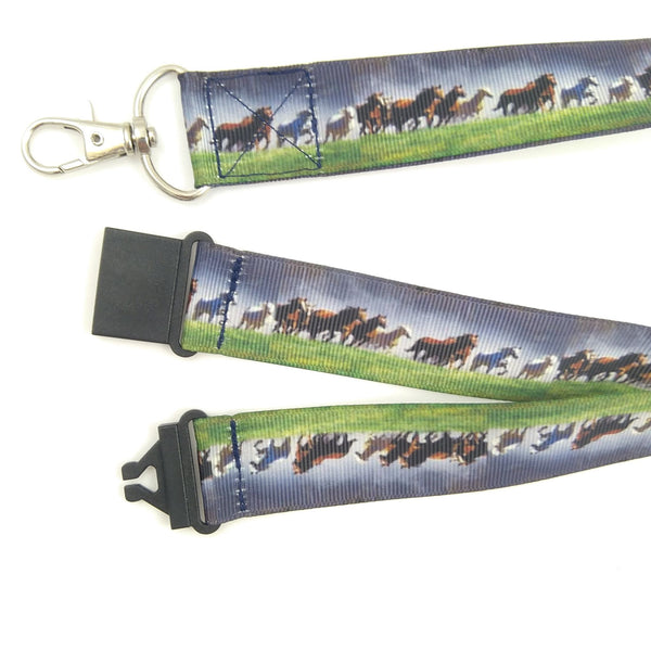 Close up of galloping horses lanyard with metal swivel clasp and black plastic safety buckle
