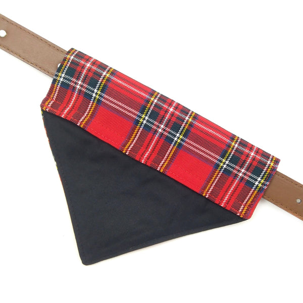 Back of red tartan dog bandana with black lining on collar from above