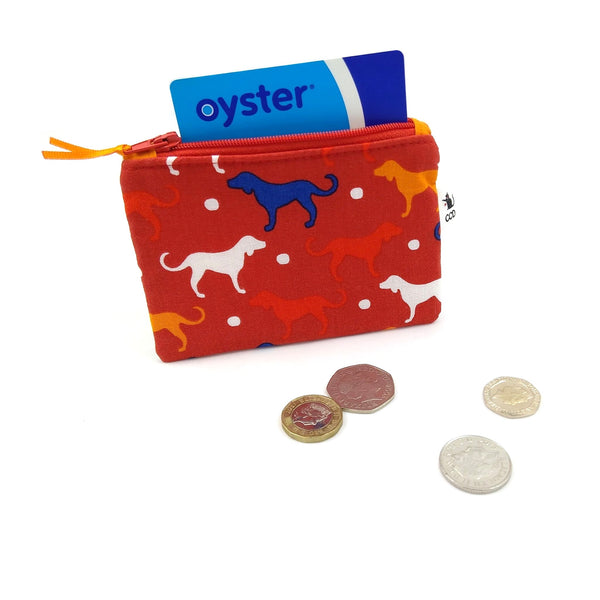 Red dog coin purse with Oyster card and coins
