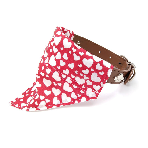 Red with white hearts dog bandana on collar from side