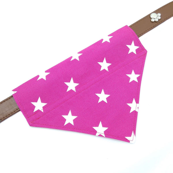 Pink stars dog bandana on collar from above