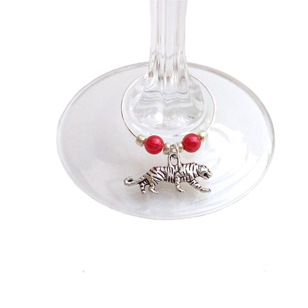 Tiger wine charm clipped onto wine glass