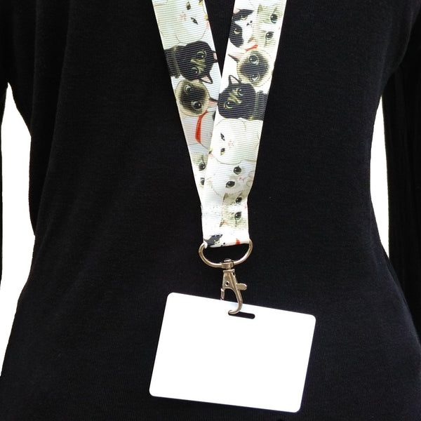 Close up of cat lanyard being worn by a woman with an ID card attached