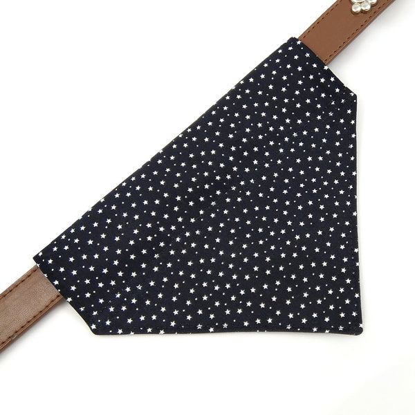 Black with white stars dog bandana on collar from above