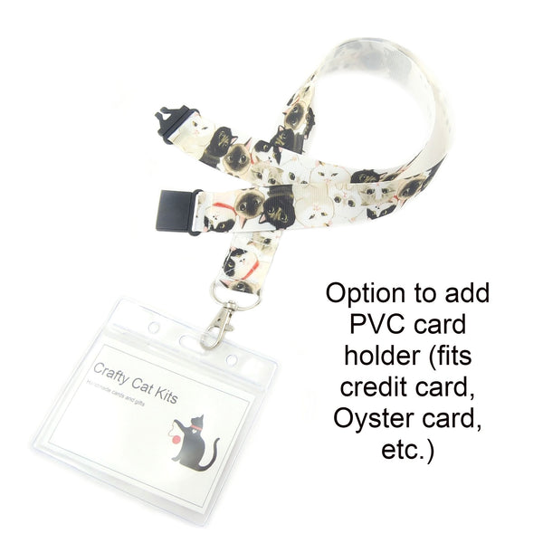 White badge holder featuring cats and kittens with a PVC card holder attached.