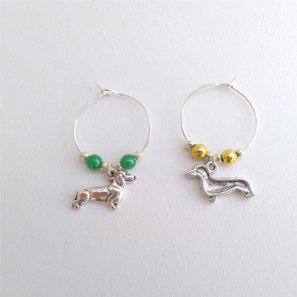 Pair of dachshund wine charms showing front and back