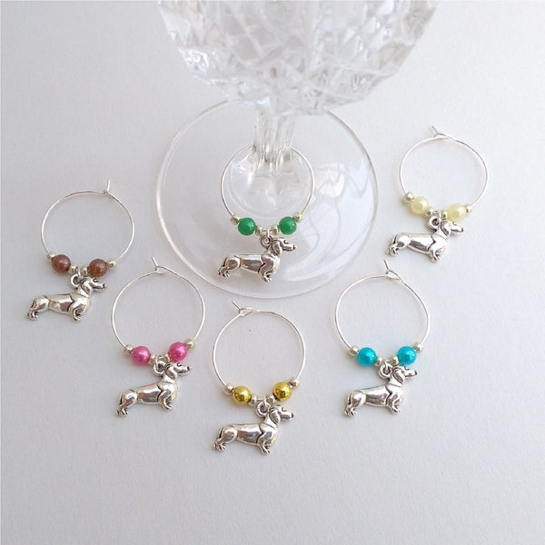 Set of 6 silver coloured dachshund wine charms