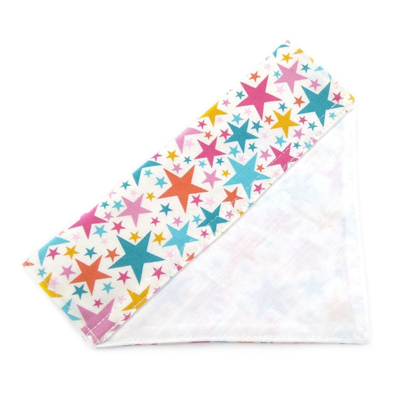 back of lined white with pastel stars dog bandana from above