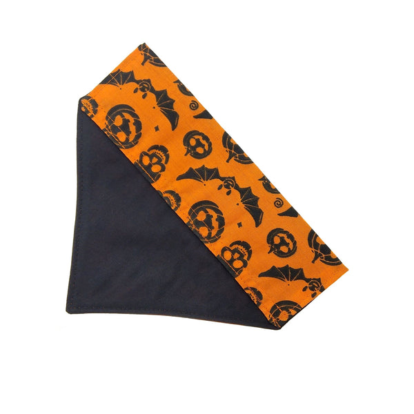 orange halloween dog bandana with black lining