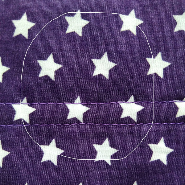 purple stars fabric with defect