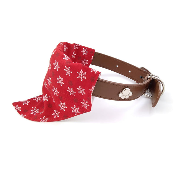 Red and white snowflake dog bandana on collar