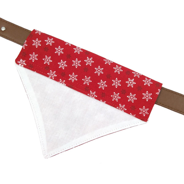Red lined snowflake dog bandana on collar