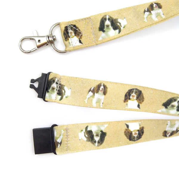 Close up of spaniel lanyard with metal swivel clasp and black plastic safety buckle