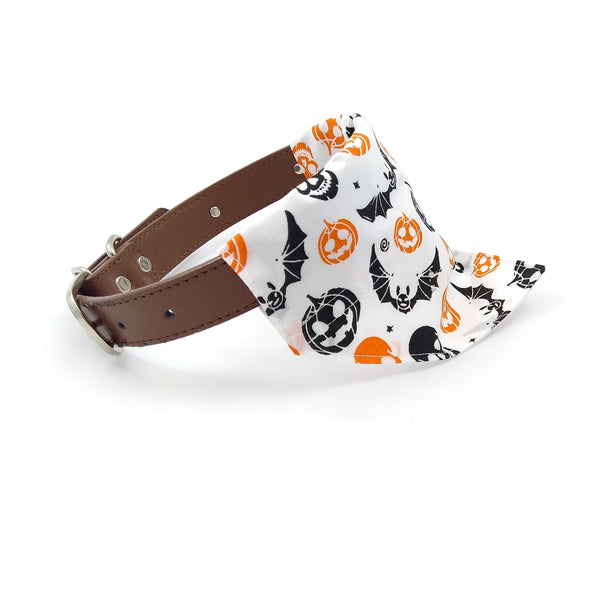 white orange and black halloween bandana on dog collar